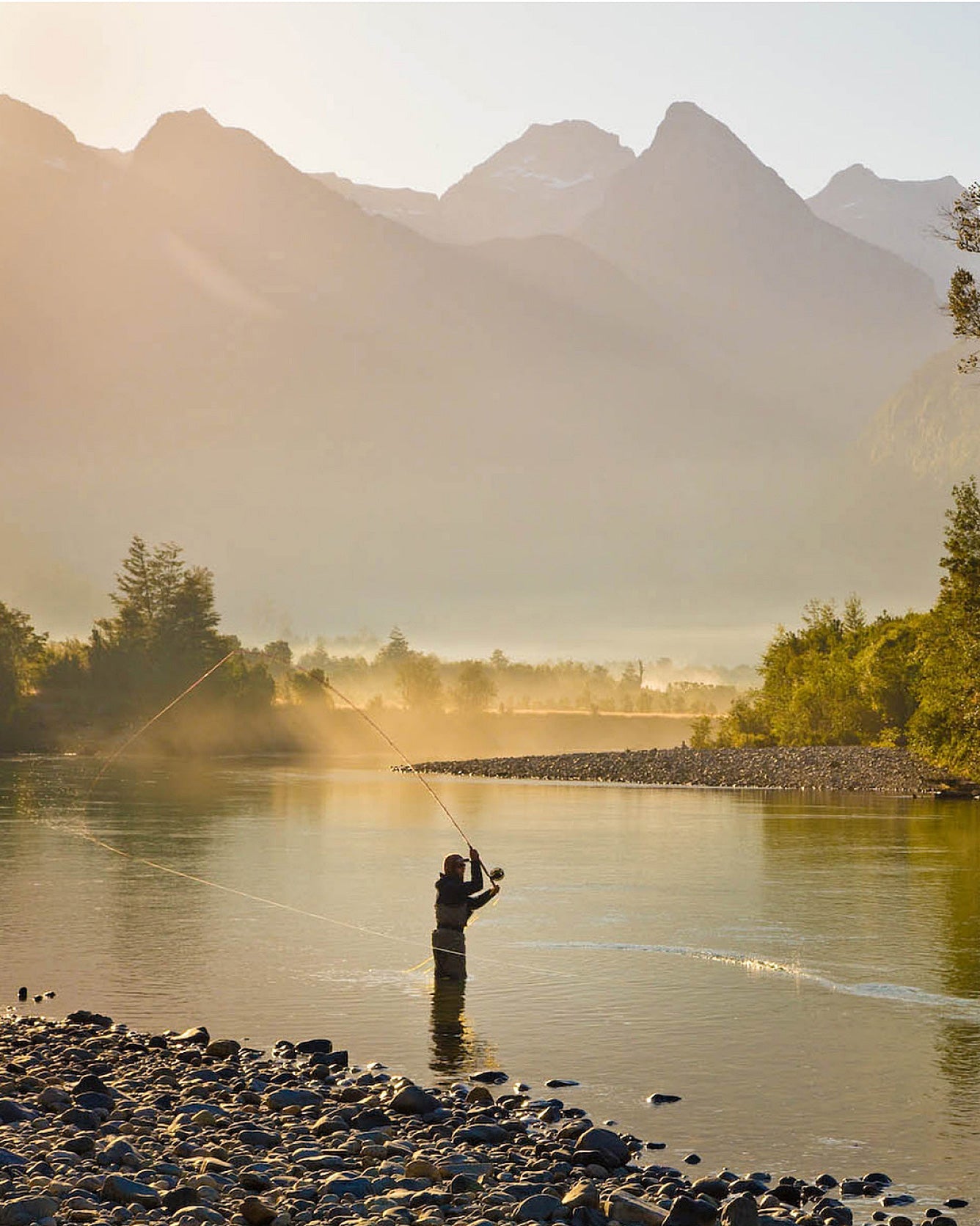 Man Fly Fishing in Stream